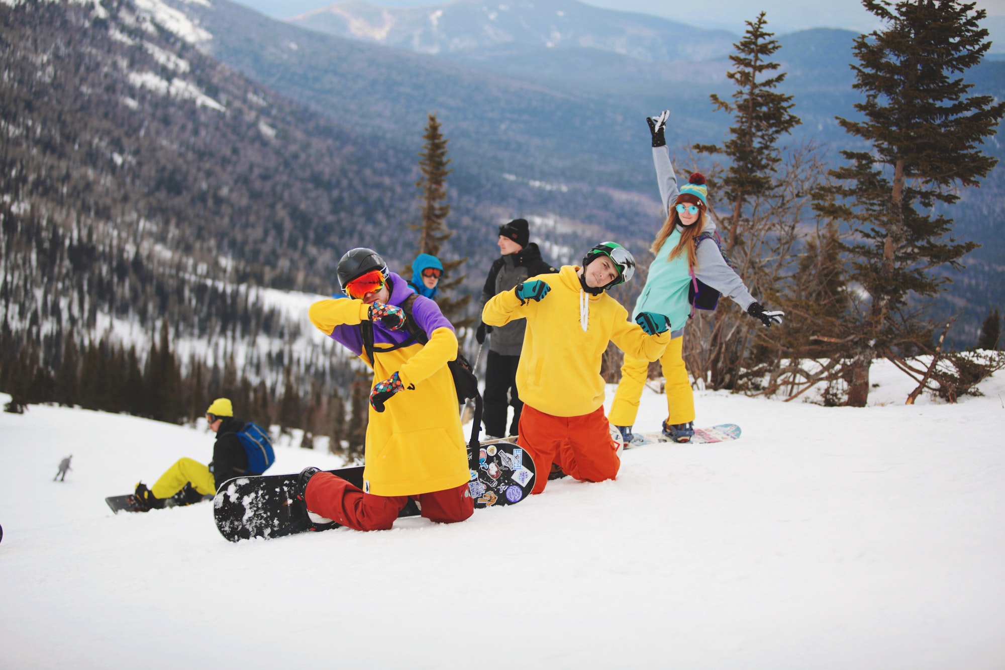 happy-snowboarders-having-fun-on-a-slope.jpg